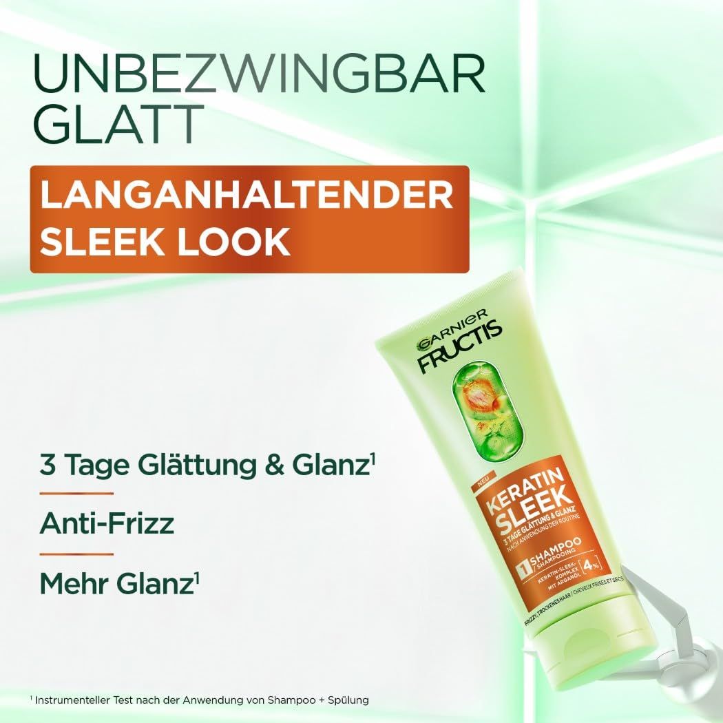 Garnier Fructis Keratin Sleek Shampoo. Tubo verde con etichetta arancione. Testo: 3 giorni di liscio & lucentezza, anti-crespo.