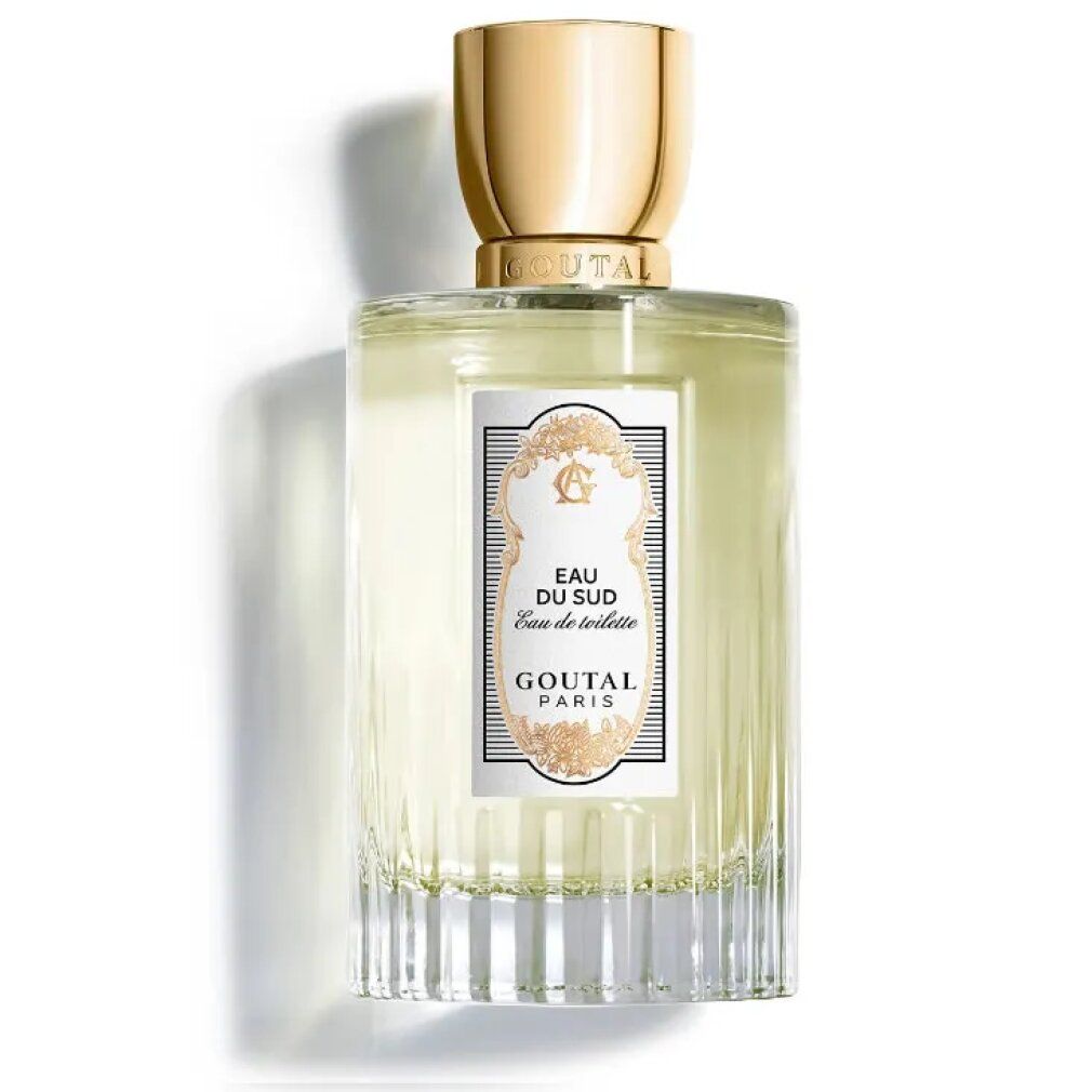 Goutal Paris Eau Du Sud Eau De Toilette Spray. Flacone rettangolare in vetro, tappo dorato. Etichetta bianca con testo e decorazioni.