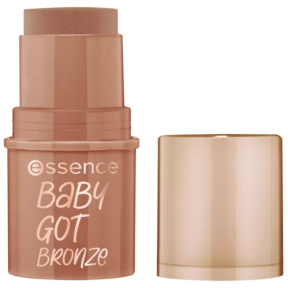 Stick bronzer con tappo aperto. Scritta Baby Got Bronze. Colore marrone. Forma cilindrica.
