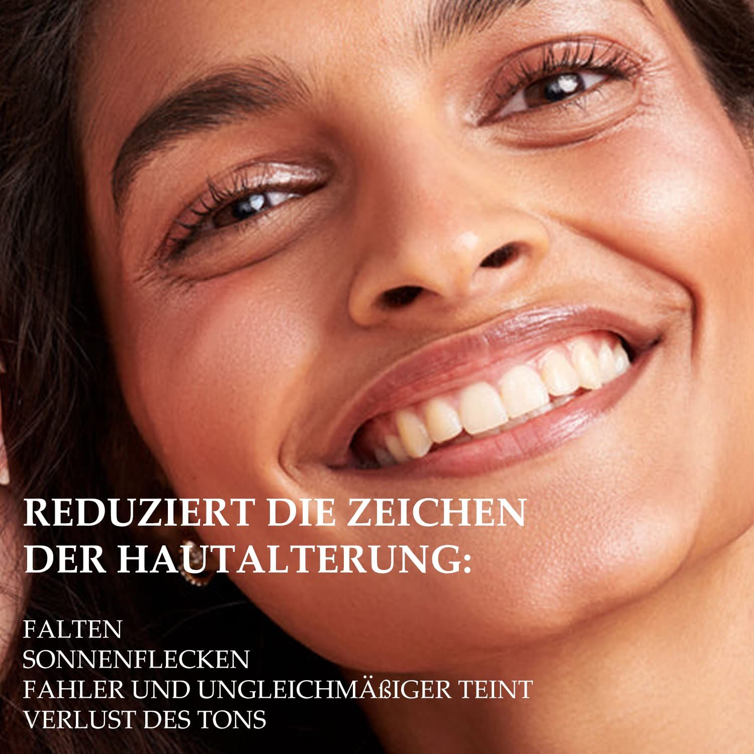 Volto di donna. Testo: Riduce i segni dell'invecchiamento: rughe, macchie solari, incarnato spento, perdita di tono.