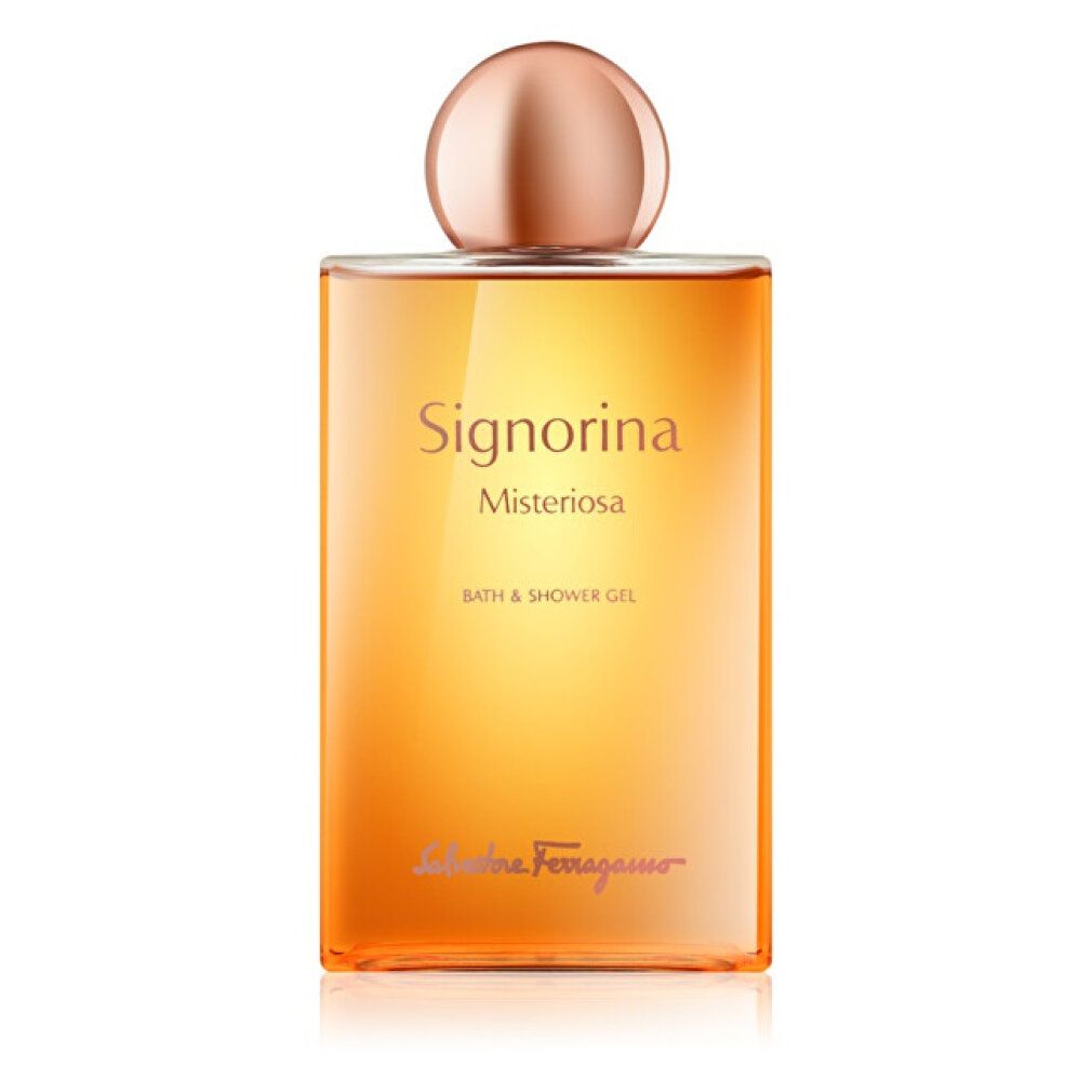 Flacone con liquido giallo-arancio. Sopra: tappo. Testo: Signorina Misteriosa, Bath & Shower Gel, Salvatore Ferragamo.