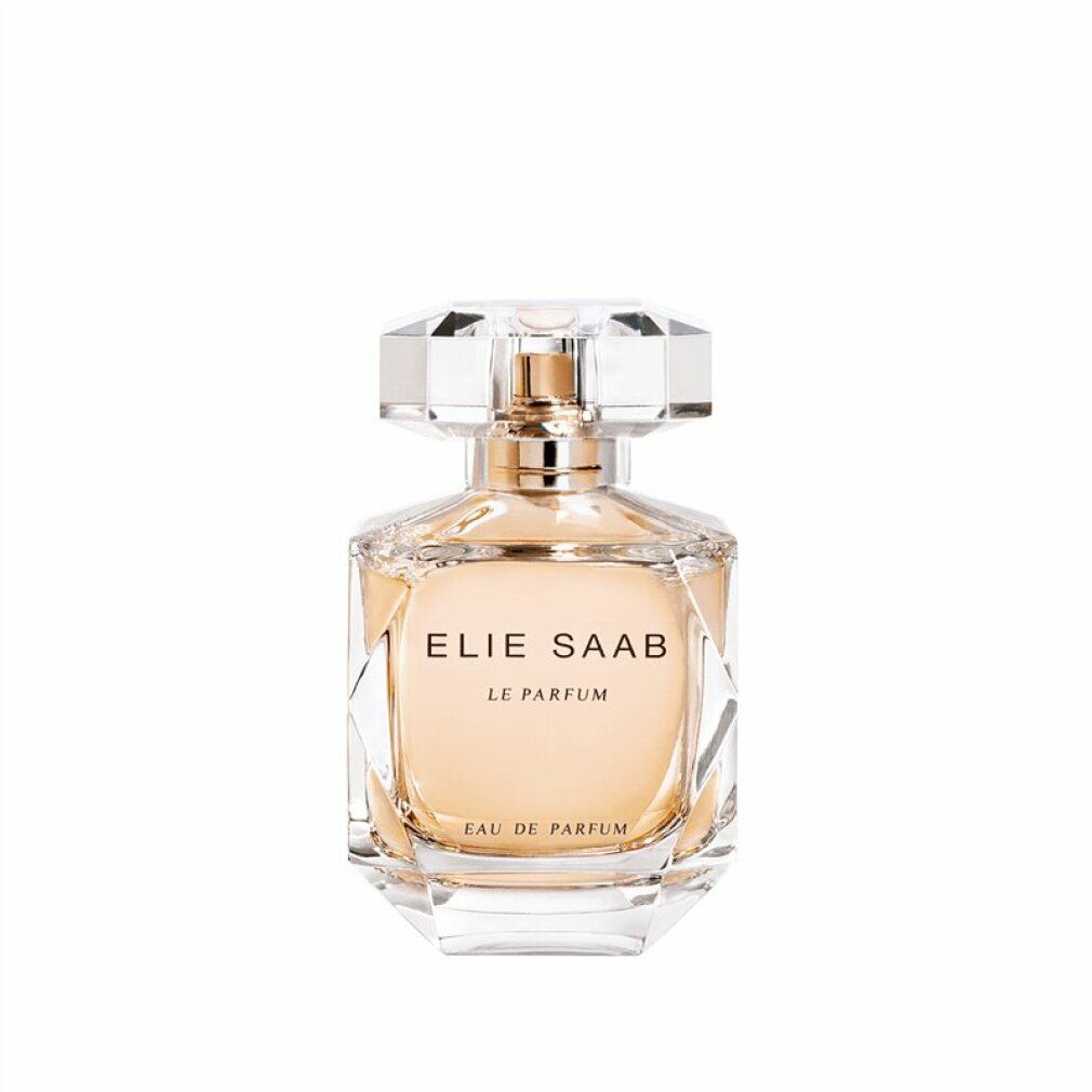 Flacone di profumo con tappo sfaccettato. Scritta: ELIE SAAB LE PARFUM. Flacone in vetro con vaporizzatore dorato. Tappo trasparente sfaccettato.