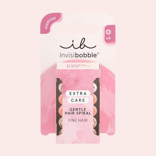 Confezione da 6 elastici per capelli. Marchio: invisibobble. Extra Care, Gentle Hair Spiral. Confezione con informazioni sul prodotto. Sfondo rosa.