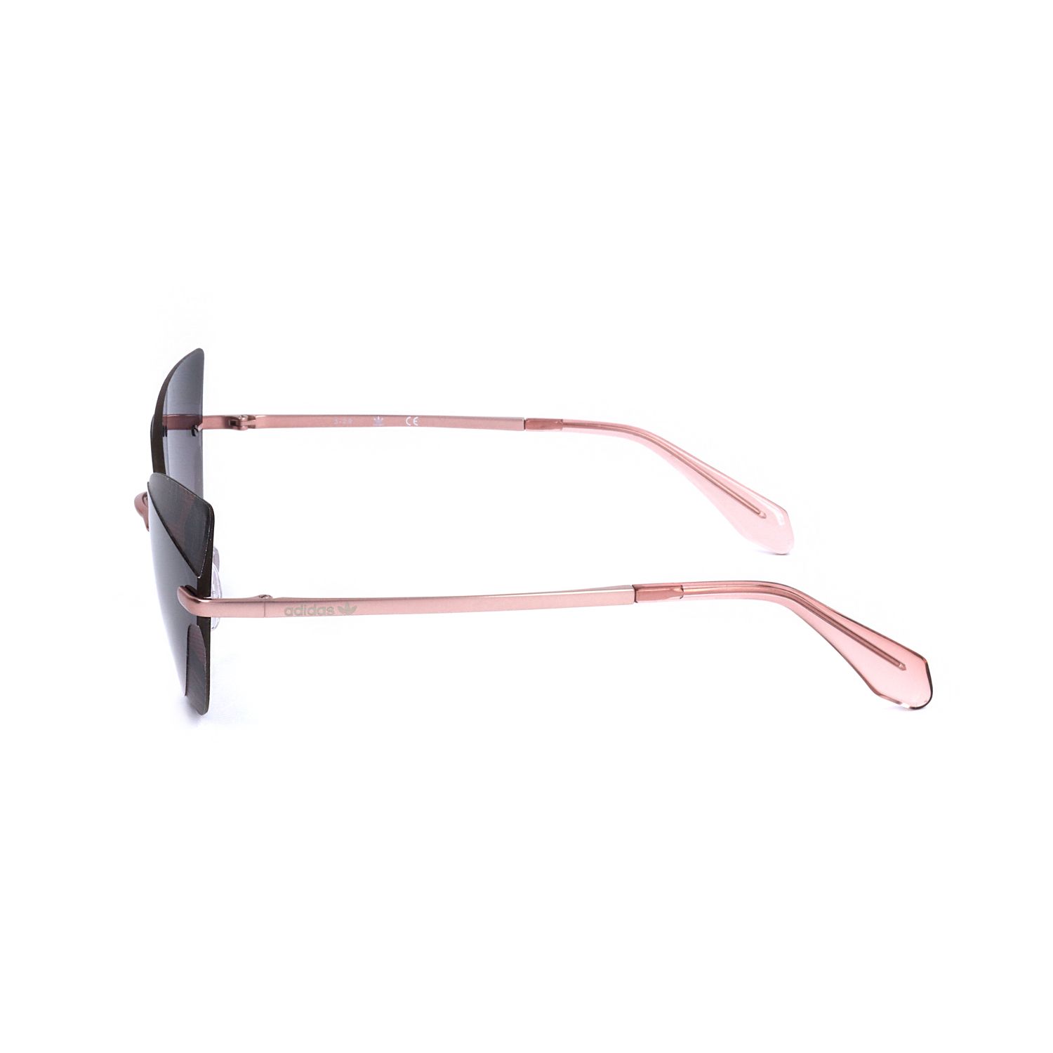 Occhiali da sole senza montatura con lenti scure e aste color oro rosa.