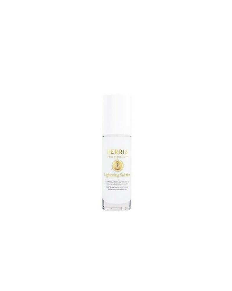 Flacone di siero bianco con etichetta dorata. Scritta: Lightening Solution. Logo del produttore.