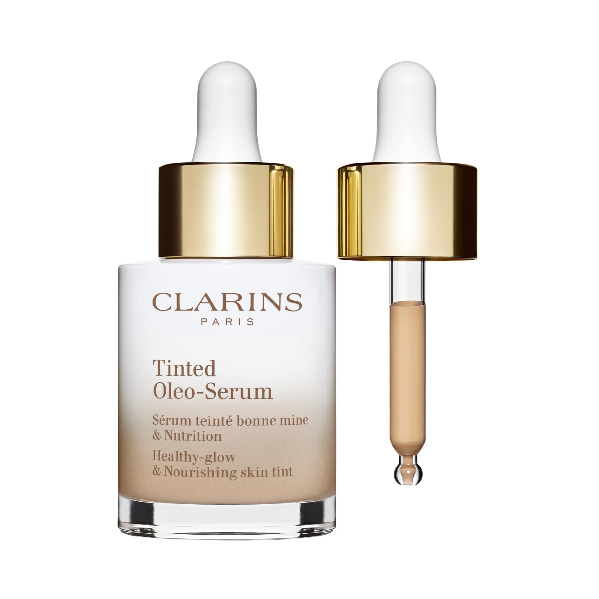 Flacone Clarins Oleo-Serum con pipetta. Vetro bianco-marrone, tappo dorato. Pipetta con liquido colorato. Scritta: Clarins Paris.