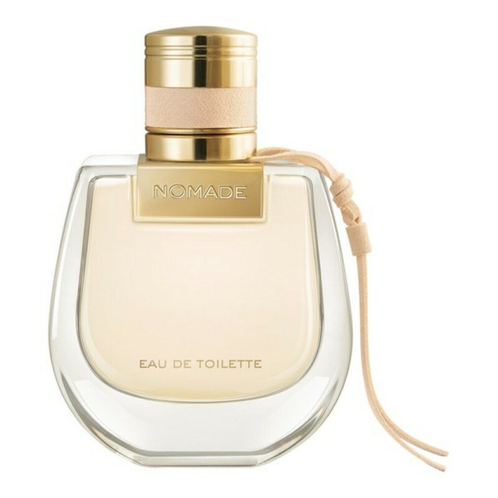 Flacone di profumo con tappo dorato e cinturino in pelle beige. Scritta "NOMADE Eau de Toilette".