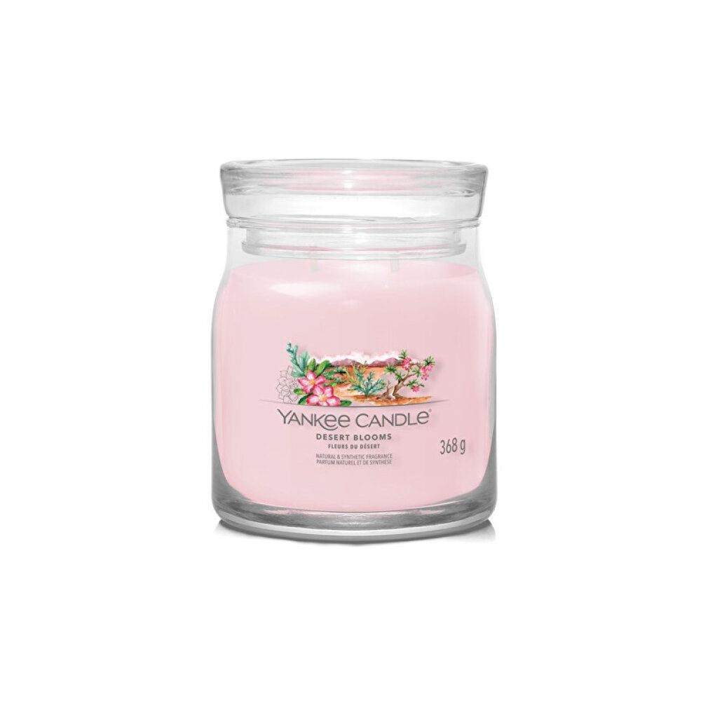 Candela rosa in barattolo di vetro. Etichetta con testo e design floreale. Coperchio in vetro. Peso: 368 g.