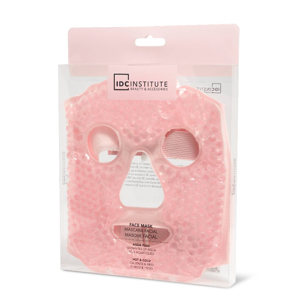 Maschera viso in gel rosa in confezione. Logo IDC INSTITUTE. Testo: Aqua Peas, Face Mask. Per uso caldo e freddo.