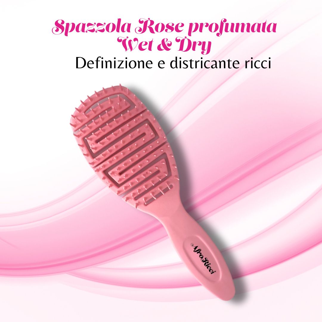 Spazzola rosa con manico. Testo: "Spazzola Rose profumata Wet & Dry Definizione e districante ricci". "AfroRicci" sul manico.