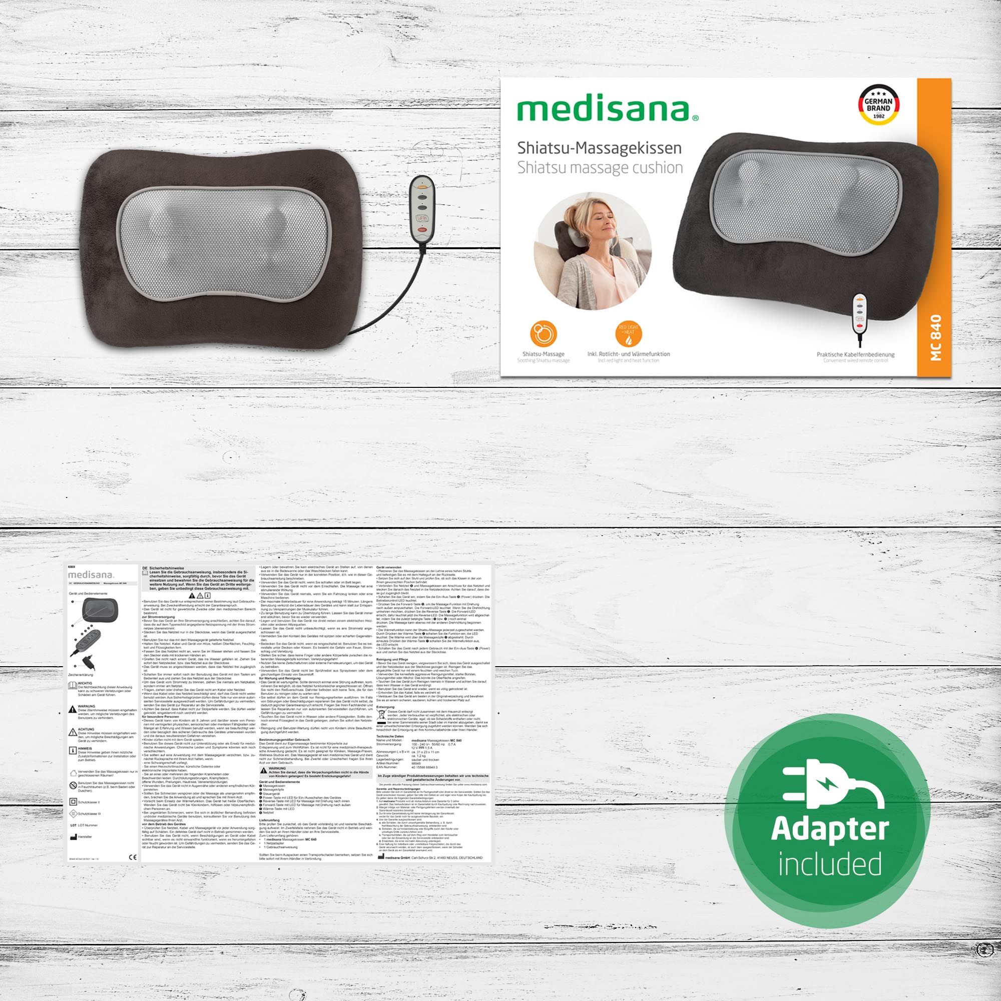 Confezione del cuscino massaggiante Shiatsu. Contiene cuscino, telecomando, adattatore e istruzioni. Marchio: medisana.