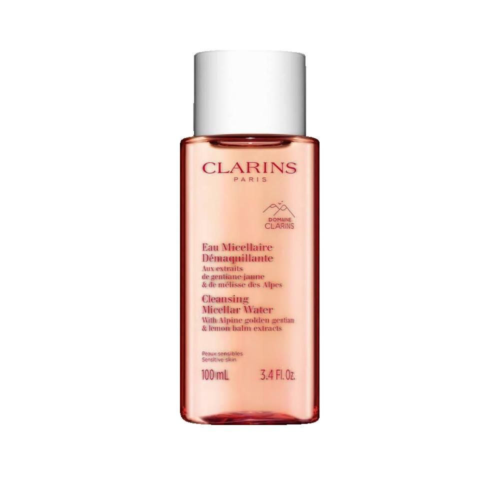 Flacone rosa con tappo bianco. Scritta: Clarins, Eau Micellaire Démaquillante, Cleansing Micellar Water.