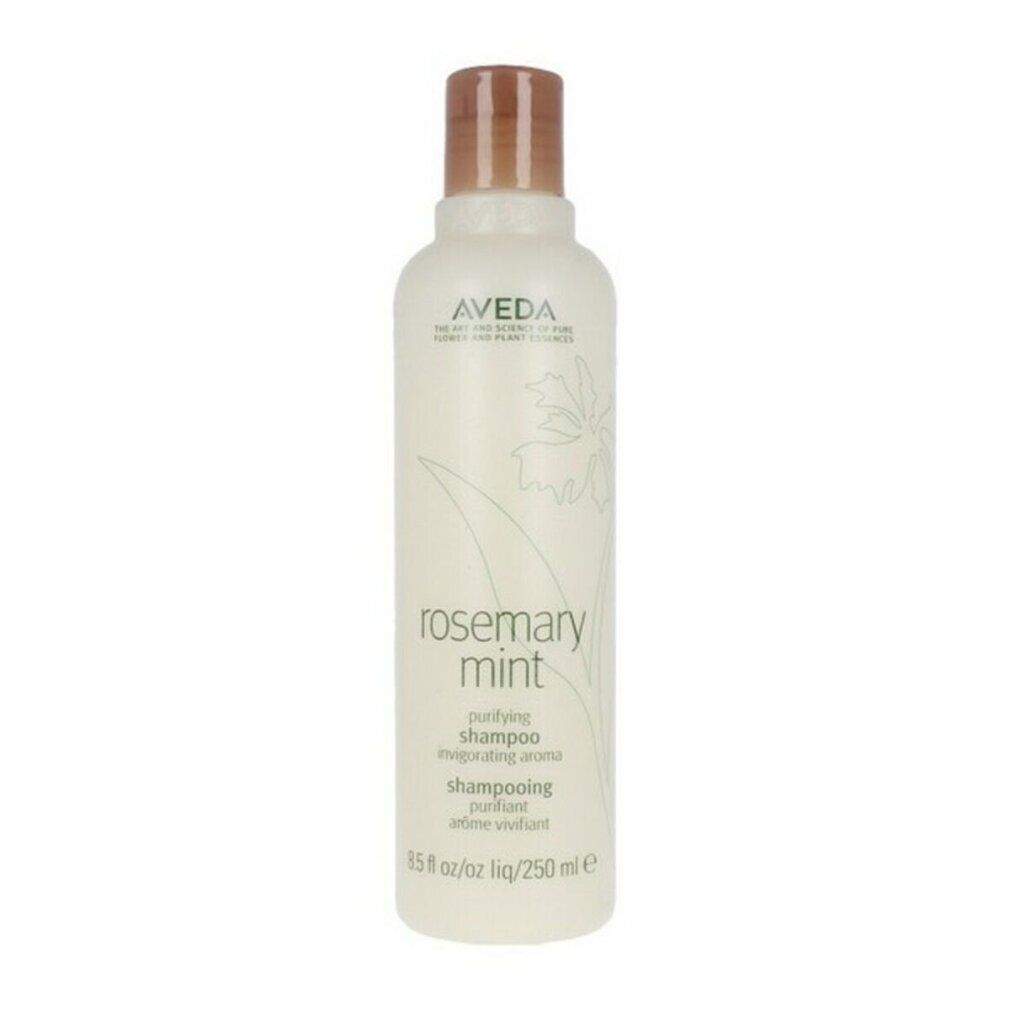 Flacone di shampoo Aveda. Etichetta bianca con testo e logo. Tappo marrone. Nome prodotto: Rosemary Mint.