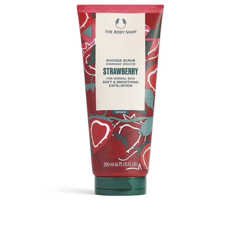 Tubo rosso con motivo a fragole e scritta. Nome del prodotto: Strawberry. Sigillo vegano.