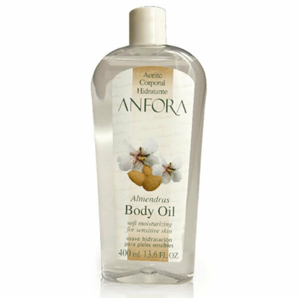 Olio corpo in bottiglia trasparente. Etichetta con ANFORA, Aceite Corporal Hidratante, Almendras Body Oil. 400 ml, 13.6 FL OZ.