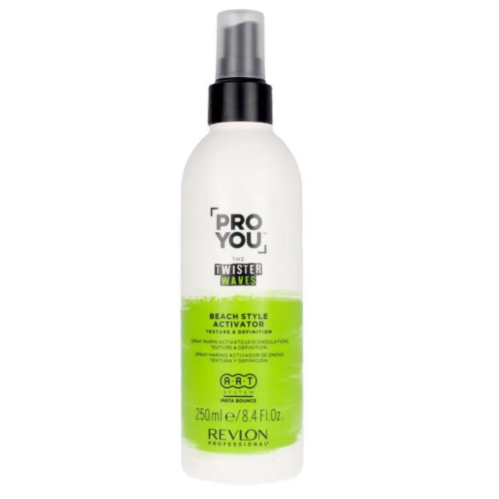 Flacone spray bianco con erogatore nero. Scritte: PRO YOU, THE TWISTER WAVES, BEACH STYLE ACTIVATOR. Etichette verdi. Revlon Professional.