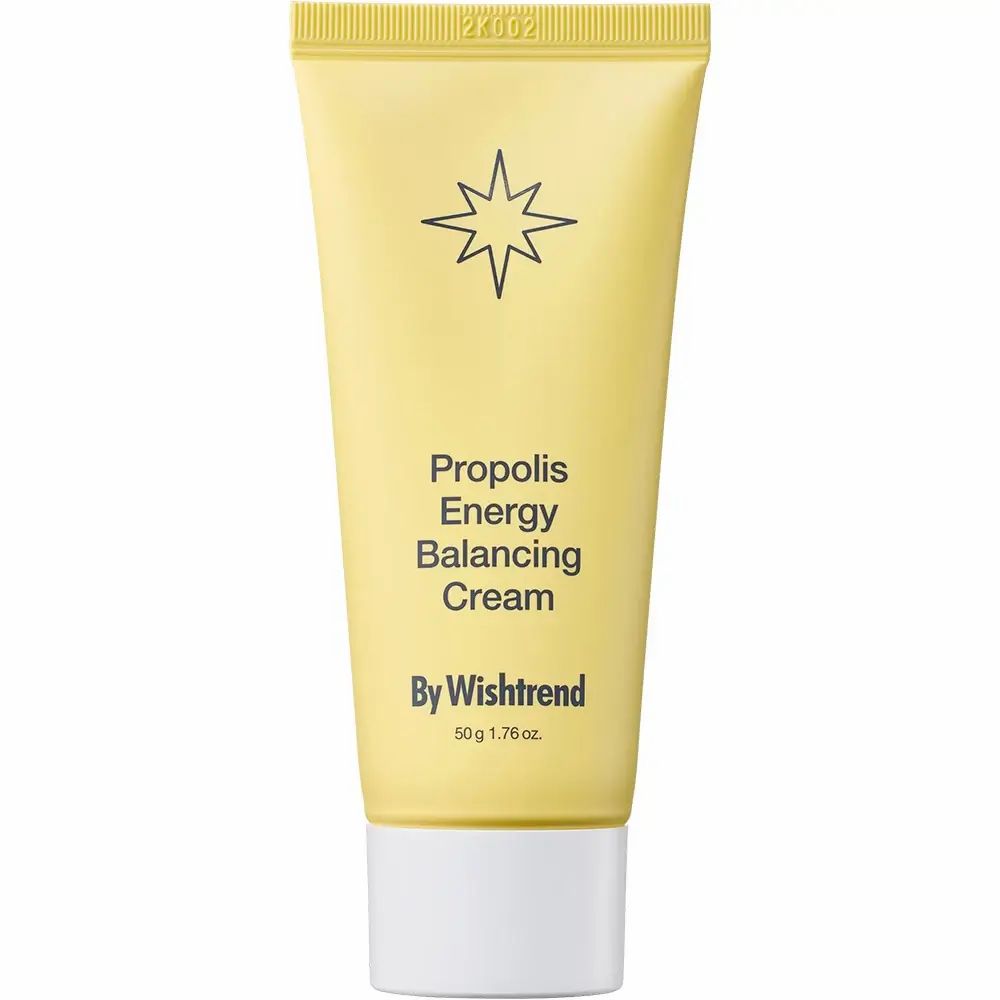 Tubo giallo con testo: Propolis Energy Balancing Cream, By Wishtrend. 50g 1.76 oz. Simbolo stella.