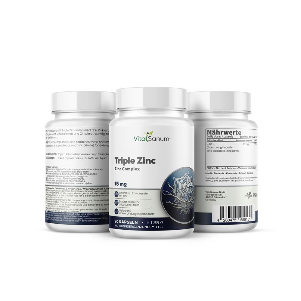 Tre flaconi bianchi VitaSanum Triple Zink. Scritta: 15 mg, 90 capsule. Etichetta con informazioni nutrizionali e logo.