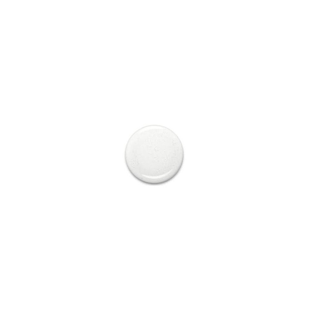 Macchia rotonda di smalto bianco. Superficie lucida.