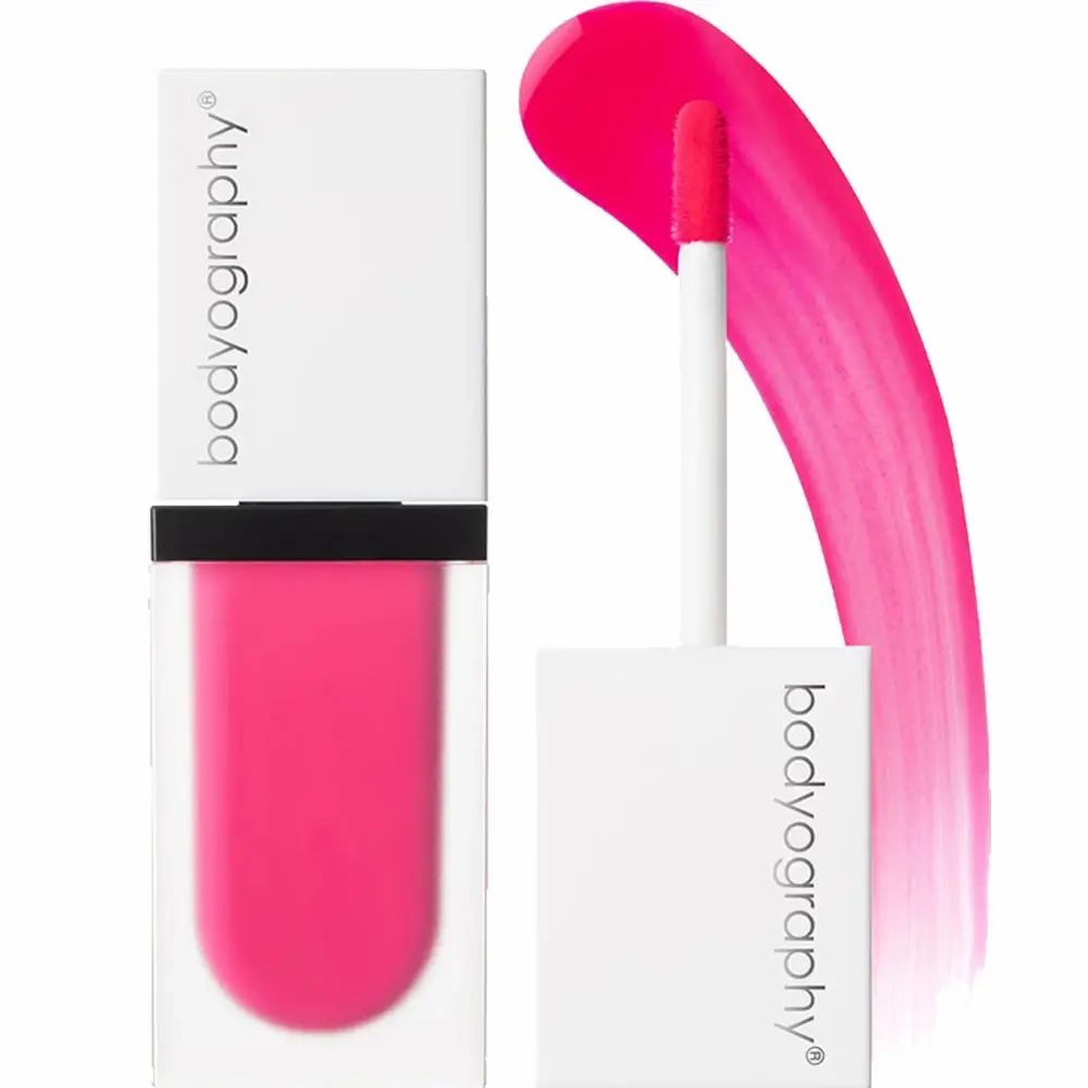 Flacone di fard liquido, marchio BODYOGRAPHY. Colore fucsia, con applicatore.