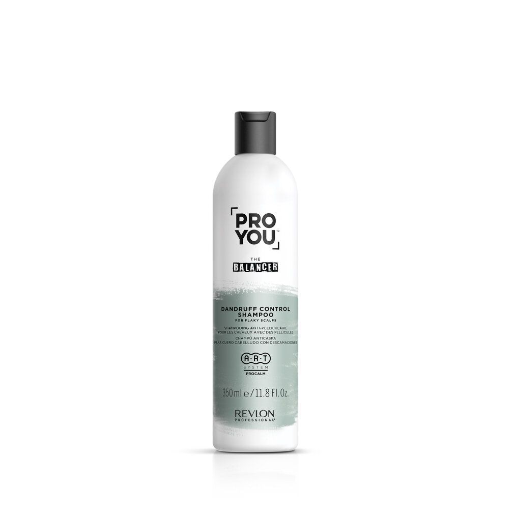 Flacone di shampoo bianco con tappo nero. Scritta: PRO YOU THE BALANCER, Dandruff Control Shampoo. Marchio: Revlon.