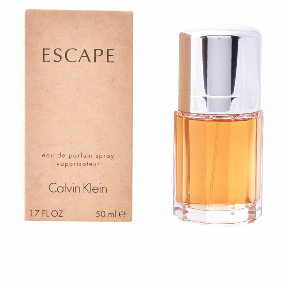 Flacone di profumo e confezione. Scritta: ESCAPE, Calvin Klein. Flacone con tappo argentato, liquido dorato. 1.7 FL OZ, 50 ml.