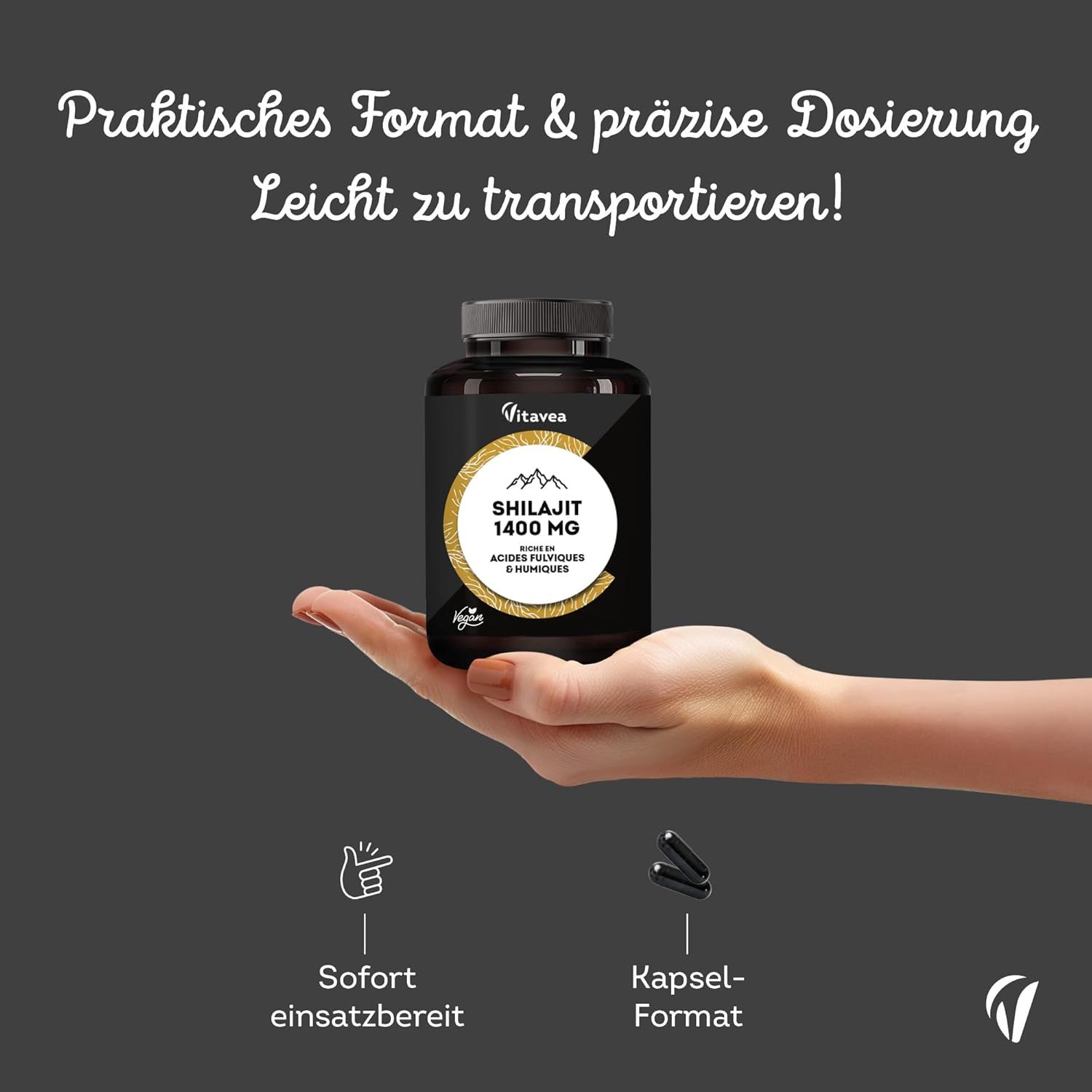 Mano che tiene un flacone Vitavea Shilajit 1400 MG. Formato capsule. Pronto all'uso.