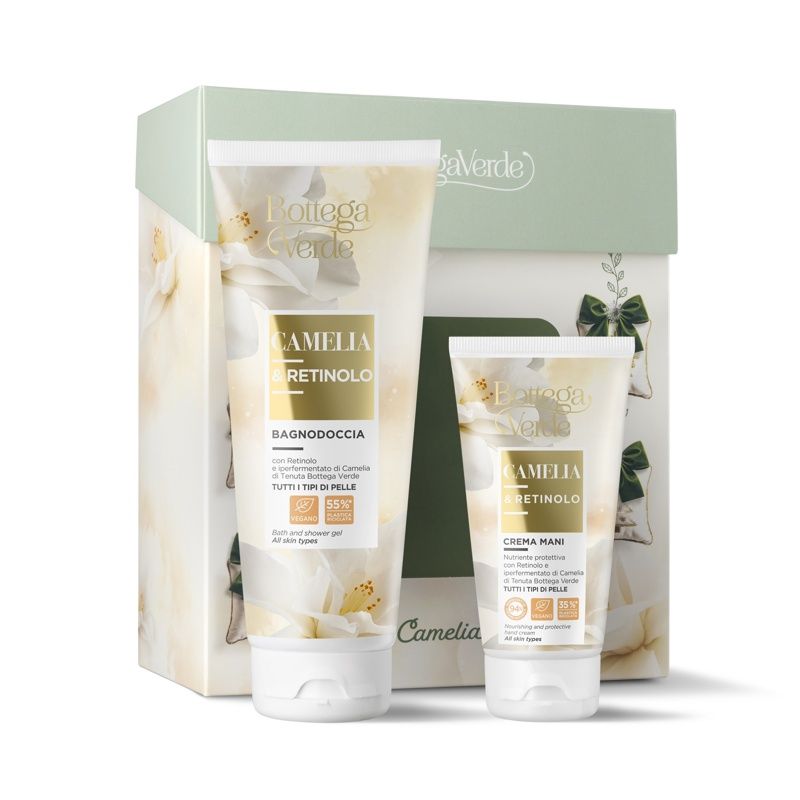 Confezione regalo con due tubi. Un tubo grande con 'Bagnodoccia', uno piccolo con 'Crema Mani'. Entrambi con 'Camelia' e 'Retinolo'.