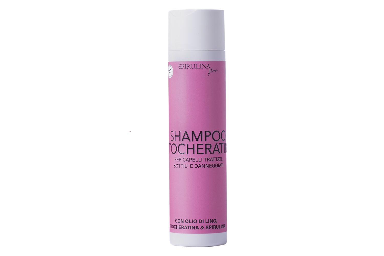 Flacone di shampoo rosa. Scritta: Shampoo Fitocheratina. Con spirulina e fitocheratina. Tappo bianco. Certificazione biologica.