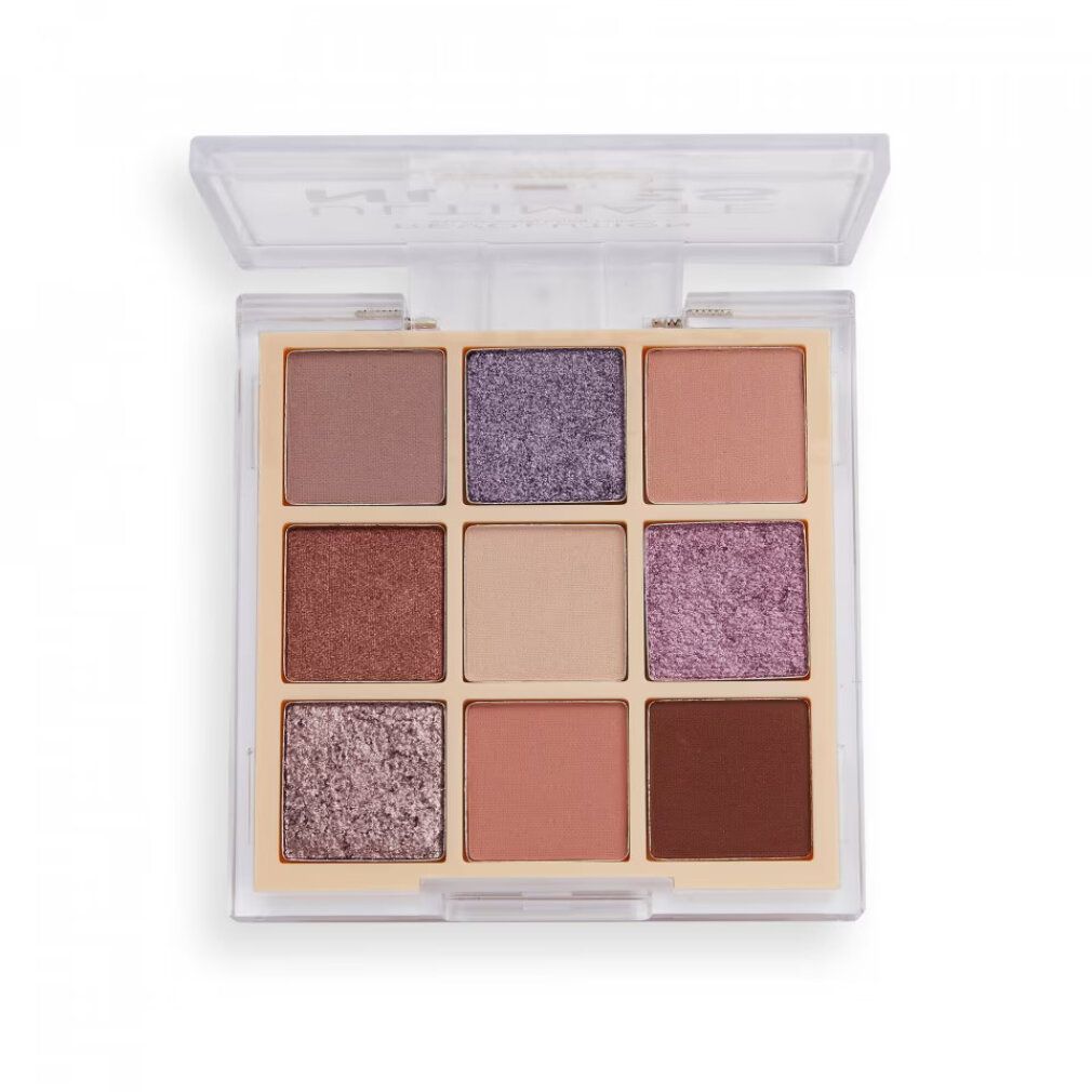 Palette ombretti aperta con nove tonalità. Scritta: ULTIMATE NUDES. Confezione trasparente.