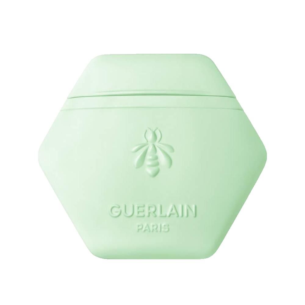 Contenitore esagonale verde chiaro con ape in rilievo e scritta Guerlain Paris.