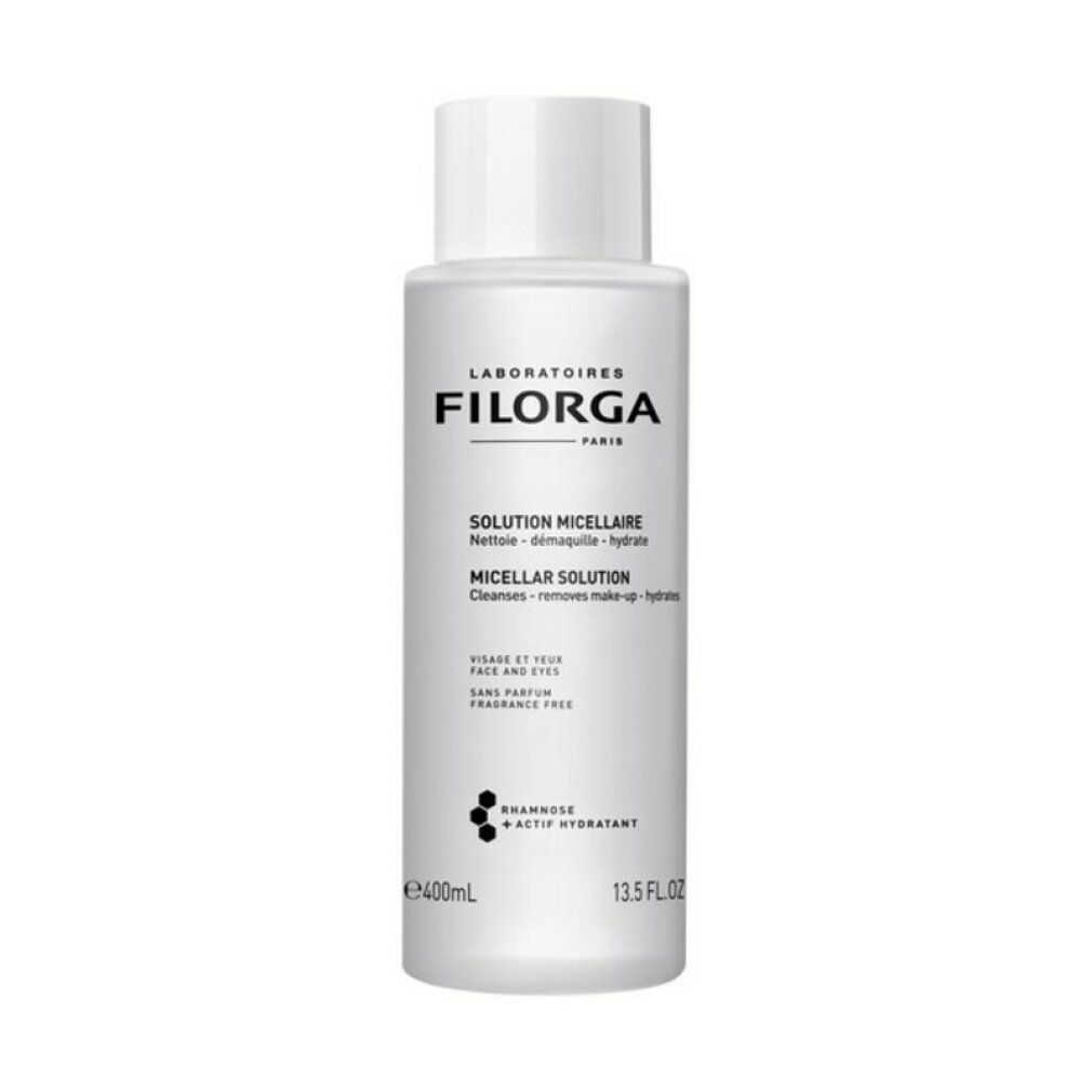 Flacone bianco con logo Filorga e testo. Scritta: Solution Micellaire. Deterge, rimuove il trucco, idrata. 400ml, 13.5 FL OZ.