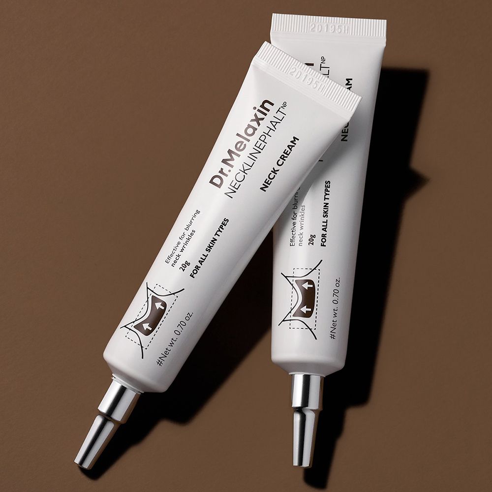 Due tubi di crema per collo Dr. Melaxin Necklinephalt su sfondo marrone.