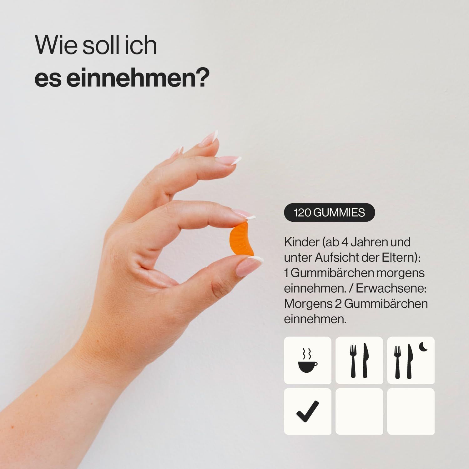 Mano che tiene una metà di caramella gommosa arancione. Testo: 120 GOMMOSE. Raccomandazioni per l'uso. Simboli dei pasti.