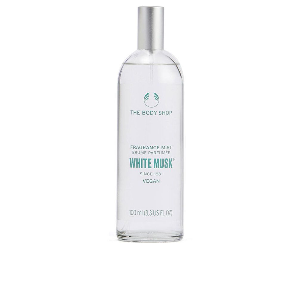 Flacone trasparente con vaporizzatore argentato. Etichetta con logo, testo: White Musk, Fragrance Mist, Vegan. Volume: 100 ml.