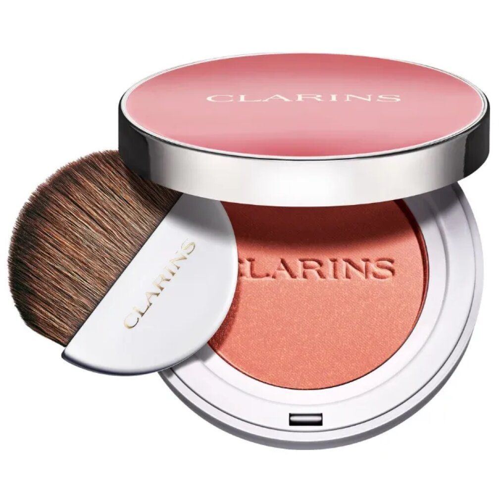 Contenitore fard con pennello. Fard rosa, bordo argentato, scritta CLARINS. Pennello con manico bianco.