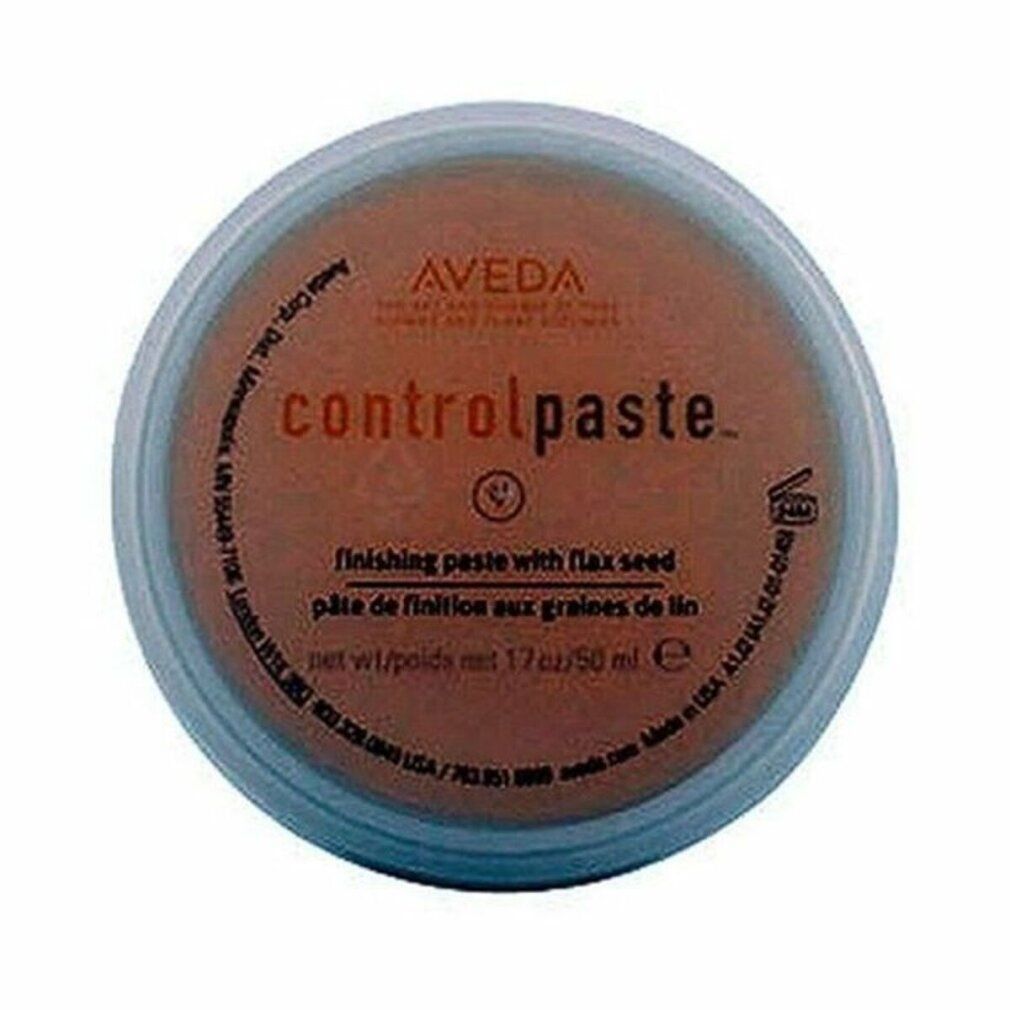 Contenitore rotondo con coperchio. Scritta: Aveda, controlpaste, finishing paste with flax seed, pâte de finition aux graines de lin. 1.7oz/50ml.
