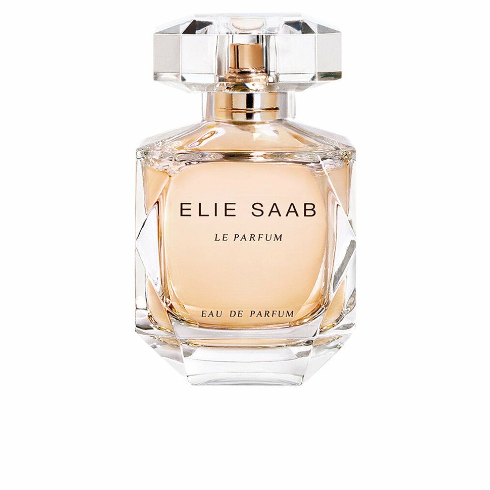 Flacone di profumo con tappo sfaccettato. Scritta: ELIE SAAB LE PARFUM. Flacone in vetro con vaporizzatore dorato. Tappo trasparente sfaccettato.