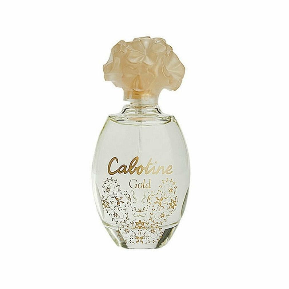 Flacone di profumo. Flacone ovale con tappo e scritta dorati. Flacone con decorazioni floreali.