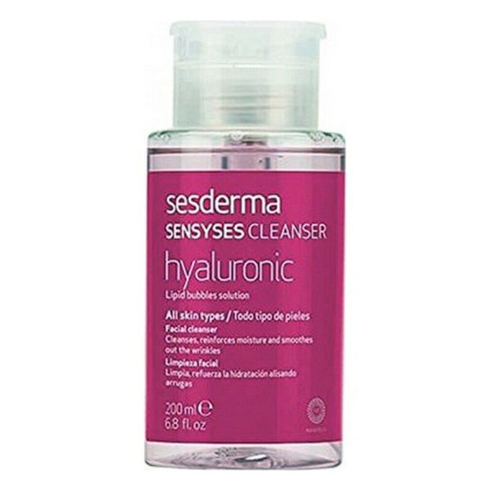 Flacone con etichetta rosa. Testo: Sesderma, Sensyses Cleanser, Hyaluronic. 200ml. Liquido trasparente visibile.