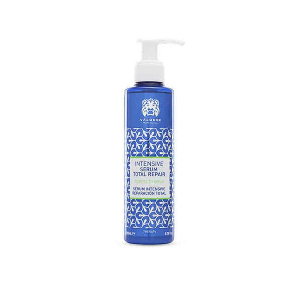 Flacone blu con dosatore bianco. Scritta: Intensive Serum Total Repair. Marchio Valquer. Motivo sul retro del flacone.