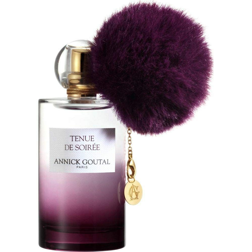 Flacone Goutal Tenue de Soiree Eau de Parfum con pompon viola e ciondolo.
