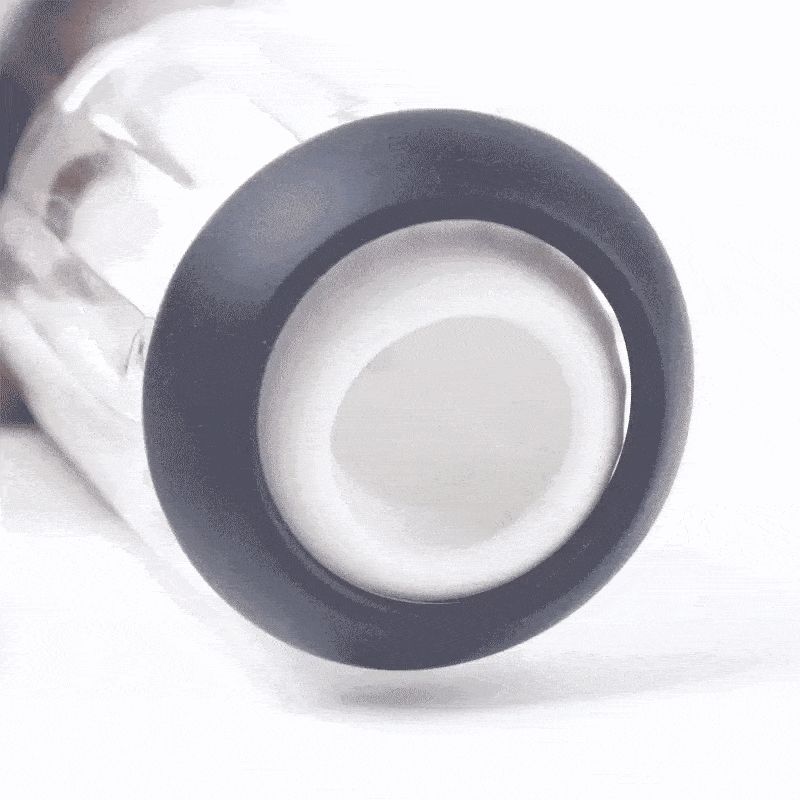 Anello grigio scuro attorno a un'apertura bianca. L'anello circonda l'apertura.