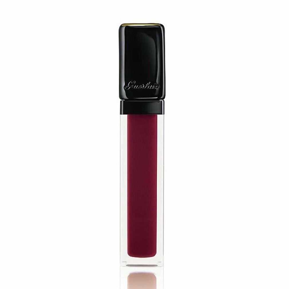 Rossetto bordeaux in un contenitore trasparente con tappo nero. GUERLAIN è scritto sul tappo.