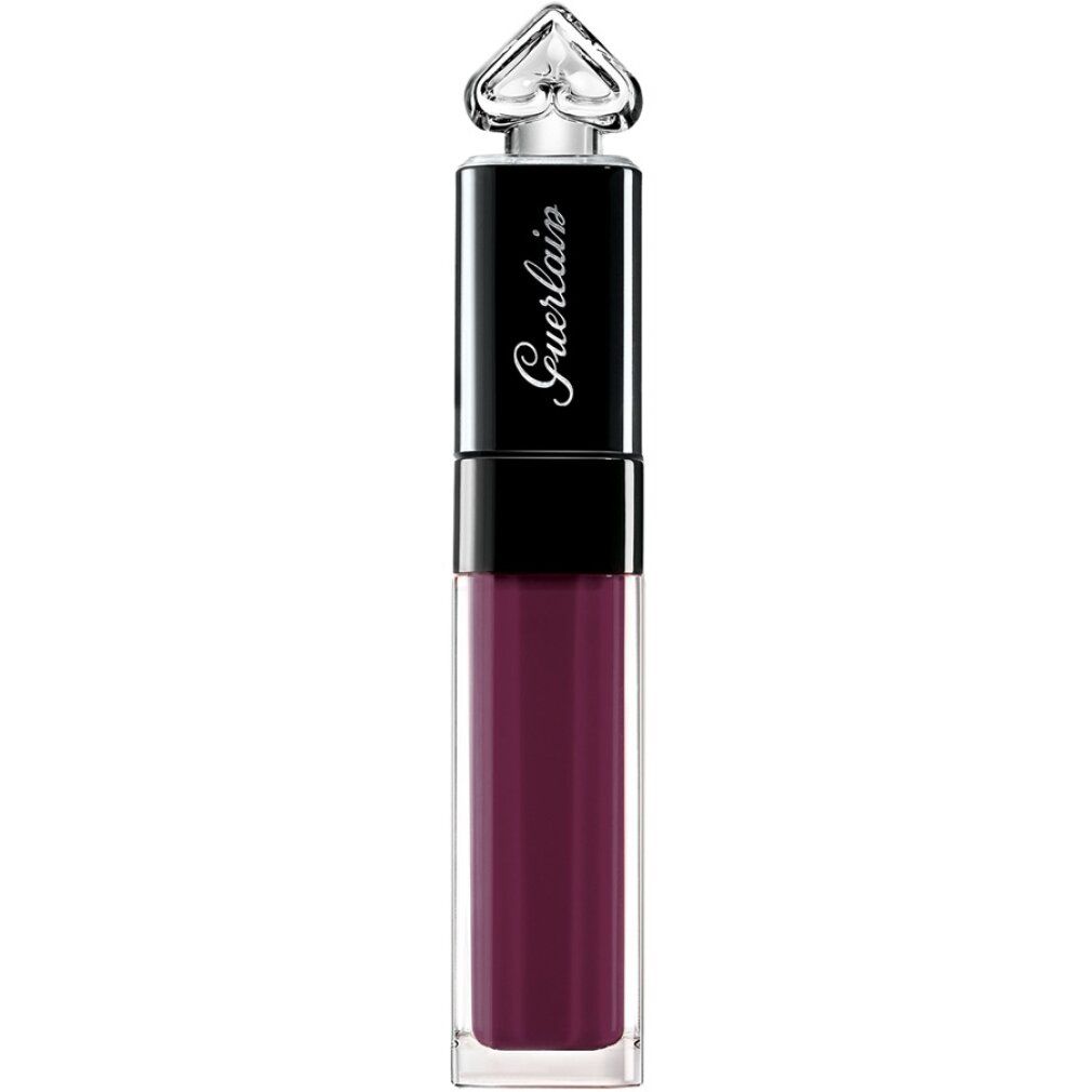 Rossetto in flacone. Contenitore trasparente con colore scuro. Tappo nero con logo del marchio. Tappo trasparente.