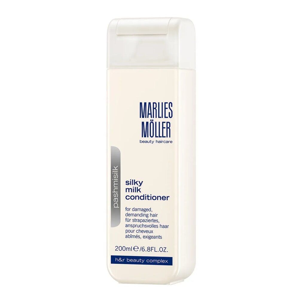 Flacone rettangolare bianco. Scritta: Marlies Möller, Silky Milk Conditioner. Testo in tedesco, francese, inglese.