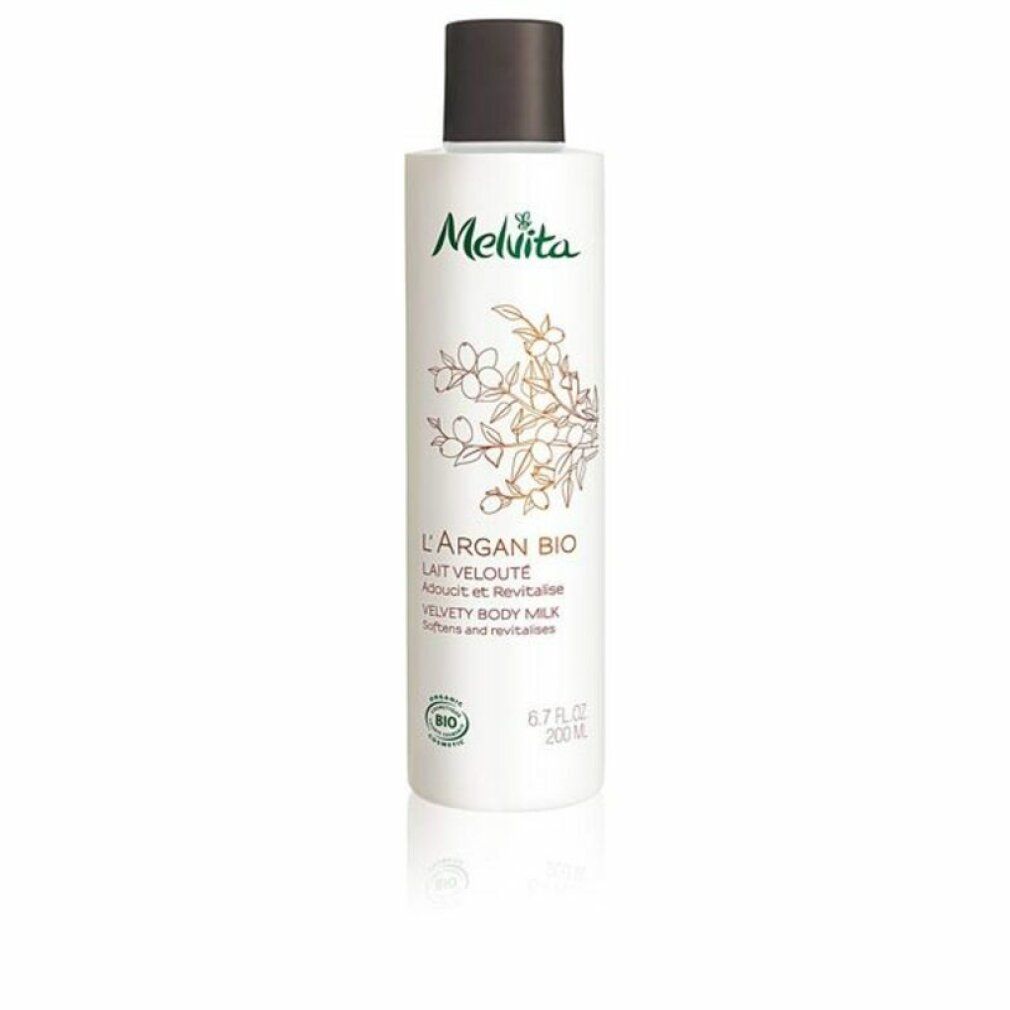 Flacone bianco con tappo marrone. Scritta Melvita, L'Argan Bio, Lait Velouté. Certificazione bio.