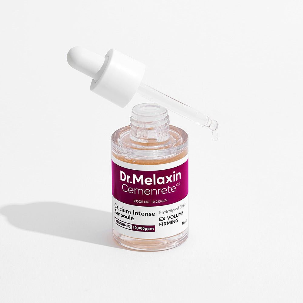 Fiala Dr. Melaxin Cemenrete con contagocce, il liquido gocciola.