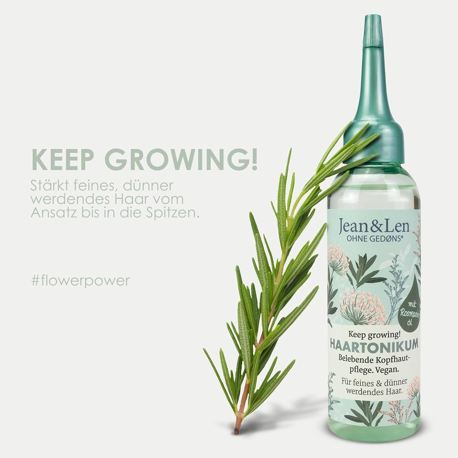 Flacone di tonico per capelli con rametto di rosmarino. Testo: KEEP GROWING! Jean & Len. Per capelli fini e diradati.