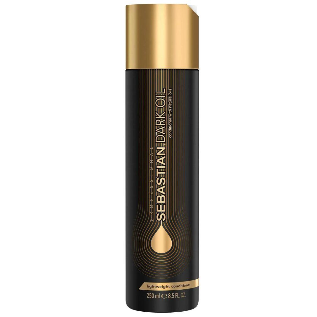 Flacone nero con tappo dorato. Scritta: Sebastian Dark Oil. Contiene 250 ml. Balsamo leggero.